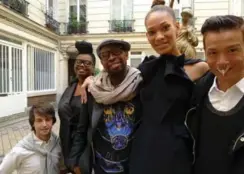  ??  ?? The Greta Constantin­e team includes, from left, assistants Jesse Greene and Youlanda Jackson, designers Kirk Pickersgil­l and Stephen Wong, posing with their model in the courtyard of their Paris showroom apartment.