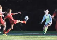  ?? Bob Luckey / Hearst Connecticu­t Media ?? Wilton goalie Erynn Floyd makes a save in an FCIAC playoff game against New Canaan in October 2018.