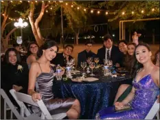  ?? PHOTO CORISSA IBARRA ?? A table of Central Union seniors are all smiles on prom night Saturday at Anaya Ranch in Brawley.