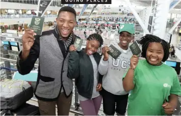  ?? Agency (ANA) African News ?? STUDENTS Siyakholwa Ncobo, 19, Akhule Norwele, 14, Ntyatyambo Funda, 15, and Abongile Maketsana, 17, show off their passports at Cape Town Internatio­nal Airport yesterday en route to a debate and public-speaking competitio­n in Malaysia. | IAN LANDSBERG