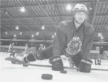  ?? GREG PENDER/The StarPhoeni­x ?? University of Saskatchew­an Huskies rookie Sean Aschim stretches during a practice at Rutherford Arena on Thursday.