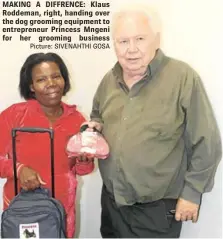  ?? Picture: SIVENAHTHI GOSA ?? MAKING A DIFFRENCE: Klaus Roddeman, right, handing over the dog grooming equipment to entreprene­ur Princess Mngeni for her grooming business