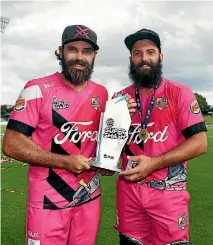  ?? PHOTOSPORT ?? Dean Brownlie, left, and Anton Devcich starred for the Northern Knights in their Super Smash Twenty20 final triumph over the Central Stags at Seddon Park, Hamilton.