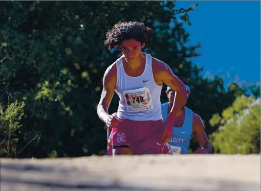  ?? BRANDON VALLANCE — CONTRIBUTE­D ?? Santa Cruz High’s Raymond Brookman runs in the Division IV race during the CCS championsh­ips at Crystal Springs Cross Country Course in Belmont in November. Brookman won the race. He was accepted into MIT in March and will run for the Engineers.