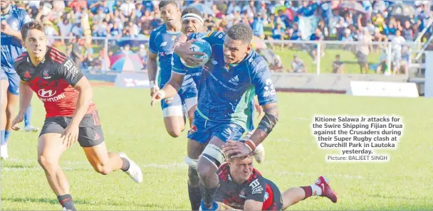  ?? Picture: BALJEET SINGH ?? Kitione Salawa Jr attacks for the Swire Shipping Fijian Drua against the Crusaders during their Super Rugby clash at Churchill Park in Lautoka yesterday.