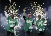  ?? AP FILE PHOTO ?? Jason Giambi, center, a Las Vegas resident, said the A's would have plenty of fan support if his former team moves to the Nevada city.