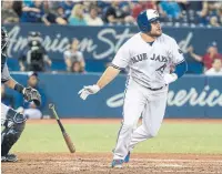  ?? FRED THORNHILL THE CANADIAN PRESS ?? Blue Jays prospect Rowdy Tellez doubles in his first major-league at-bat. “I was trying not to cry,” he said after.