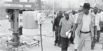  ??  ?? Vice President Phelekezel­a Mphoko tours a methane gas extraction site in Lupane recently