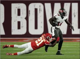  ?? DAVID J. PHILLIP - THE ASSOCIATED PRESS ?? Tampa Bay Buccaneers wide receiver Chris Godwin is tackled by Kansas City Chiefs cornerback Bashaud Breeland during the first half of the NFL Super Bowl 55 football game Sunday, Feb. 7, 2021, in Tampa, Fla.