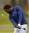  ?? Gerry Broome / Associated Press ?? North Carolina A&T’s J.R. Smith debuted as a college golfer in Burlington, N.C.
