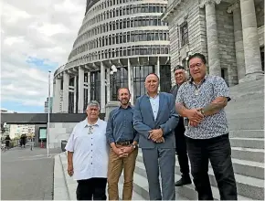  ??  ?? Left to right: Rudy Taylor, Andrew Little, Pita Tipene, Hone Sadler (behind) and Raniera (Sonny) Tau at Parliament.