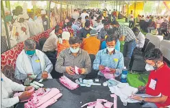  ?? HT ?? File photo of a counting hall for panchayat elections, in Govindpura­m Grain Mandi, Ghaziabad.