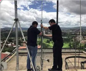  ??  ?? ABOVE Inmarsat engineers at work in Kigali, another type of smart city