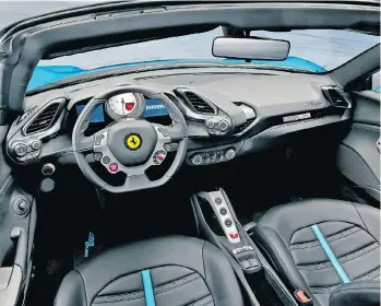  ??  ?? The Ferrari 488 Spider’s interior is quite modern and the controls fall readily to hand.