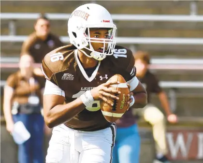  ?? RICK KINTZEL/THE MORNING CALL ?? Lehigh quarterbac­k Nigel Summervill­e looks for a receiver in Saturday’s game against Yale at Goodman Stadium in Bethlehem.