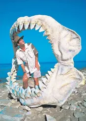  ?? ?? A 1,500lb great white shark bares two rows of teeth off the coast of Mexico. Wildlife presenter Nigel Marven stands inside the jaws of a megalodon, a shark that lived 4 million years ago