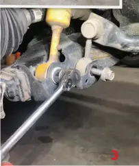  ??  ?? Step 3 Remove lower strut bolt and disconnect sway bar.