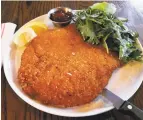  ?? Contribute­d photo ?? Rothbard's take on schnitzel as seen in a restaurant publicity photo.