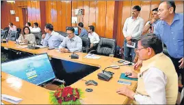  ?? HT PHOTO ?? Chief minister Pushkar Singh Dhami launches a system for registrati­on and time-bound redressal of complaints and grievances received through an online portal, in Dehradun on Friday.