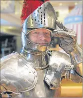  ??  ?? Paul Murton tries on the armour