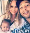  ??  ?? Chrissy Teigen and John Legend with baby Luna