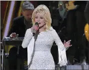  ?? ASSOCIATED PRESS FILE PHOTO ?? Dolly Parton performs at the 53rd annual CMA Awards in Nashville, Tenn.