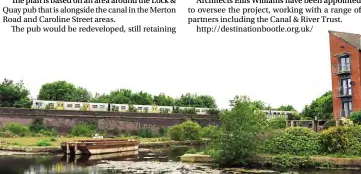  ?? PHOTOS: COLIN WAREING, COLIN AND CAROLE’S CREATIONS ?? The developmen­t area is bisected by the Liverpool to Southport railway line, with a train from Hunts Cross to Southport about to cross the canal with the Lock & Quay pub on the other side of the railway embankment.