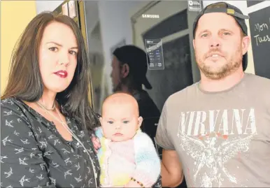  ?? Picture: Alan Langley FM4928370 ?? Hayley and Andy Richards with baby Darcy. The mum says she lost the breast milk she had stockpiled for the toddler because of a faulty freezer