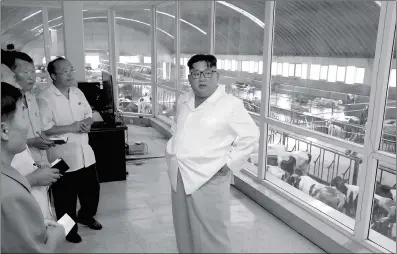  ??  ?? This undated picture released by North Korea’s official Korean Central News Agency (KCNA) on Monday shows North Korean leader Kim Jong-un speaking to staff during an inspection of the Ungok Area General Stock Farm in South Pyongan Province. He is scheduled to meet South Korean President Moon Jae-in in Pyongyang in September.