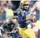  ?? AP ?? Navy quarterbac­k Malcolm Perry runs past Army defensive lineman Edriece Patterson last season in Philadelph­ia.