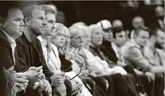  ?? Mark Mulligan / Staff file photo ?? Rockets owner and Landry’s CEO Tilman Fertitta, second from left, said his hospitalit­y company, which also owns five Golden Nugget casinos, is losing a little more than $2 million a day.