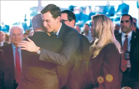  ?? Abir Sultan EPA/Shuttersto­ck ?? ISRAELI Prime Minister Benjamin Netanyahu, left, welcomes Jared Kushner and his wife, Ivanka Trump, on Sunday in Jerusalem.