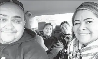  ?? FAMILY PHOTO ?? Saul and Mayra Velazquez take a selfie in a car. In the back seat are Mayra’s parents, Maria and Francisco Gomez. Mayra’s father, mother and husband died weeks apart in May of complicati­ons related to COVID-19.