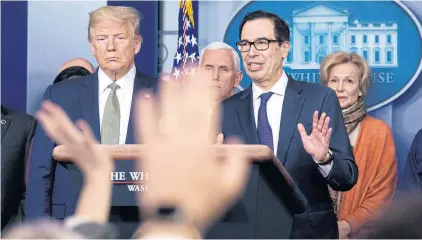  ?? BLOOMBERG ?? Steven Mnuchin, Treasury secretary, right, speaks beside President Donald Trump during a Coronaviru­s Task Force news conference in the briefing room of the White House on Tuesday.