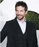  ?? (Kevork Djansezian/Reuters) ?? ACTOR BRADLEY COOPER poses during the GQ Men of the Year party in West Hollywood, California.