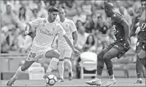  ??  ?? Marco Asensio werd deze zomer in verband gebracht met clubs als Paris Saint-Germain, Arsenal en zelfs Barcelona, maar de aanvaller van Real Madrid is gelukkig bij de club van trainer Zinédine Zidane. (Foto: Goal)