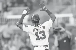  ??  ?? The Braves’ Ronald Acuna Jr. is hitting .292 with 23 homers. DALE ZANINE/USA TODAY