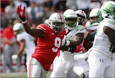  ?? JAY LAPRETE — THE ASSOCIATED PRESS ?? Defensive lineman Zach Harrison are looking to bounce back from a loss to Oregon on Sept. 11.