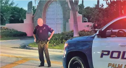  ?? ANDRES LEIVA/USA TODAY NETWORK ?? Law enforcemen­t is on the scene in Palm Beach, Fla., on Monday after the FBI acted on a search warrant at former President Donald Trump’s home at the Mar-a-Lago resort.