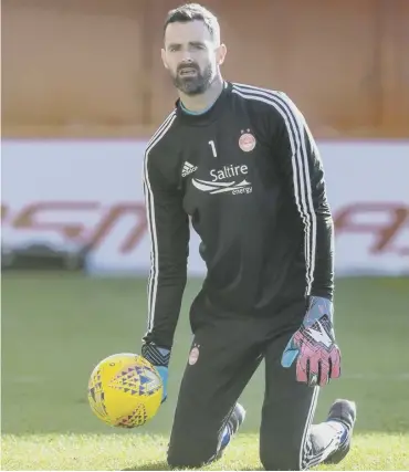  ??  ?? 0 Aberdeen keeper and captain Joe Lewis is desperate to become a history-maker at the club.