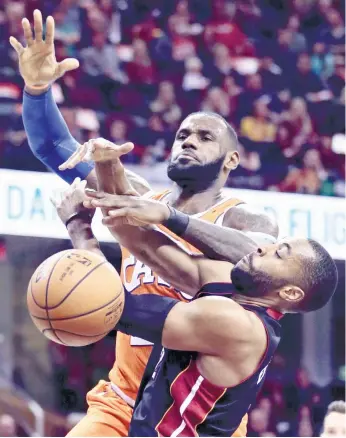  ?? (AP FOTO) ?? GOING UP. LeBron James now has 27,315 career points in the NBA, making him No. 9 in the all-time list.