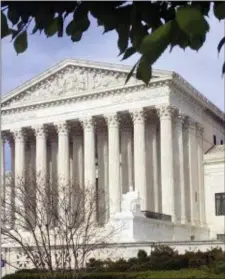  ?? JESSICA GRESKO — THE ASSOCIATED PRESS FILE ?? This file photo shows the Supreme Court in Washington. The court ruled on Thursday that U.S. courts do not have to accept as conclusive foreign government­s’ explanatio­ns of their own laws.