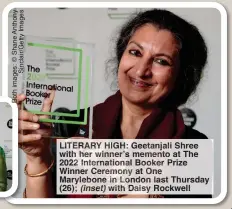  ?? ?? LITERARY HIGH: Geetanjali Shree with her winner’s memento at The 2022 Internatio­nal Booker Prize Winner Ceremony at One Marylebone in London last Thursday (26); (inset) with Daisy Rockwell