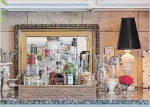  ??  ?? A beautifull­y styled bar is always at the ready in the kitchen, so guests can help themselves.