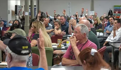  ?? Emily Matthews/Post-Gazette photos ?? Some people at the town hall meeting offered solutions to the recent violence, such as making the South Side a gun free zone, while others asked that additional police officers be added to the area.