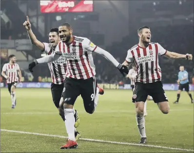  ?? PICTURE: SIMON BELLIS/SPORTIMAGE. ?? THAT’LL DO NICELY: Leon Clarke wheels away to celebrate scoring Sheffield United’s third goal against Derby.