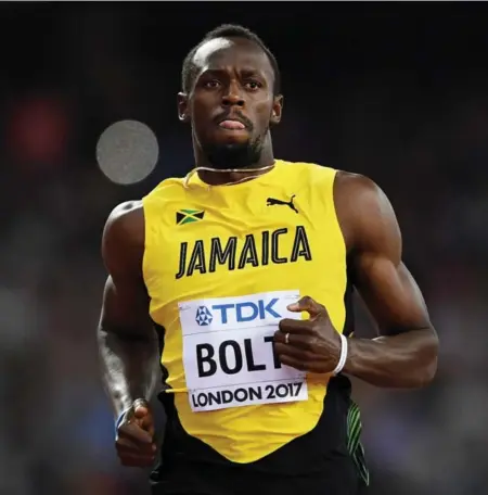  ?? SHAUN BOTTERILL/GETTY IMAGES ?? Usain Bolt, the Olympic and world champion, was slow out of the blocks in the heats of the 100 metres Friday but still won easily in 10.07 seconds.