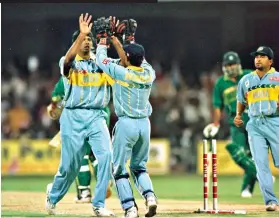  ?? Photos: GETTY IMAGES ?? The Aamir Sohail-Venkatesh Prasad verbal duel ends with Prasad shattering his stumps, Bangalore, circa 1996