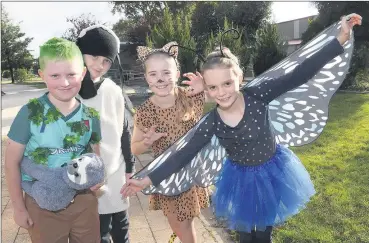  ??  ?? SUPPORTERS: From left, Ararat West Primary School students Jimmy Mcdougall, Logan Sewell, Milla Harris and Ella Gerrard show off their animal costumes.