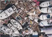  ??  ?? An aerial view of storm-damaged boats in Panama City, Florida.